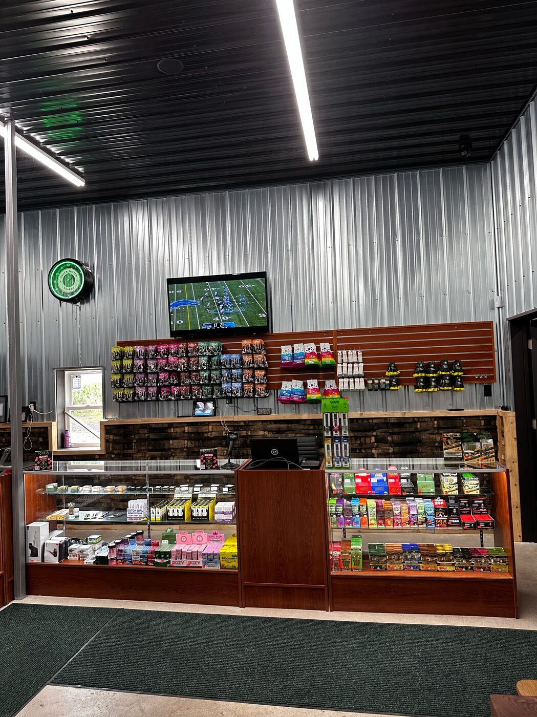 The retail counter and display cases inside the Highway Dispos store.